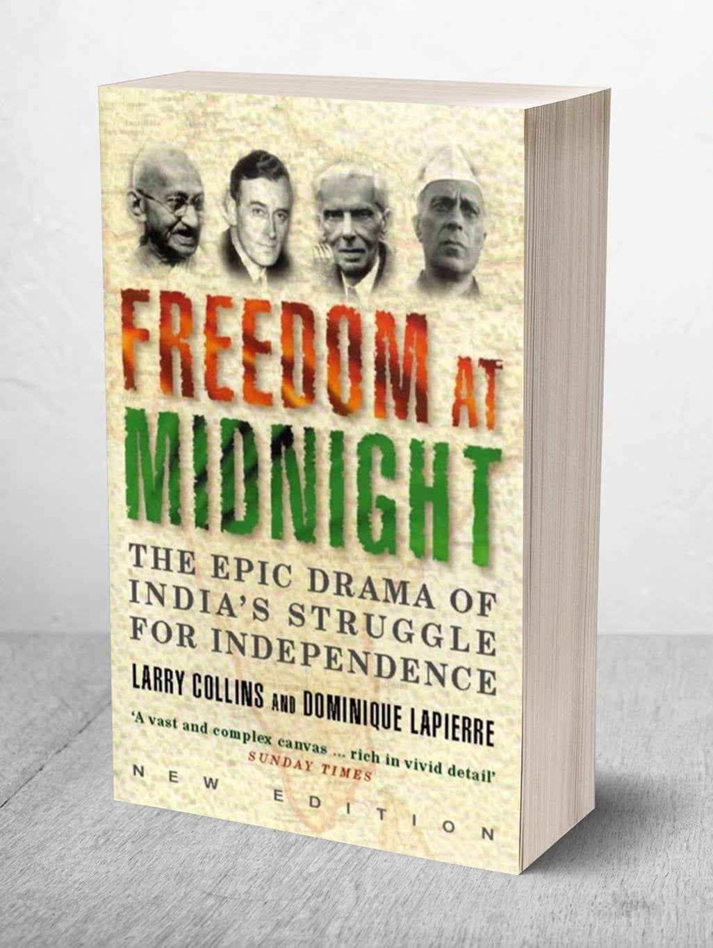 The book cover of 'Freedom at Midnight' by Larry Collins and Dominique Lépierre, shown as a 3D mockup on a light gray background. The cover features portraits of four Indian independence leaders at the top, with the title in large, textured red and green letters over a beige, parchment-like background.
