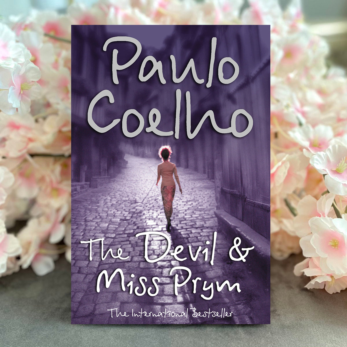The Devil and Miss Prym by Paulo Coelho – Paperback Front Cover | Kitab Markaz