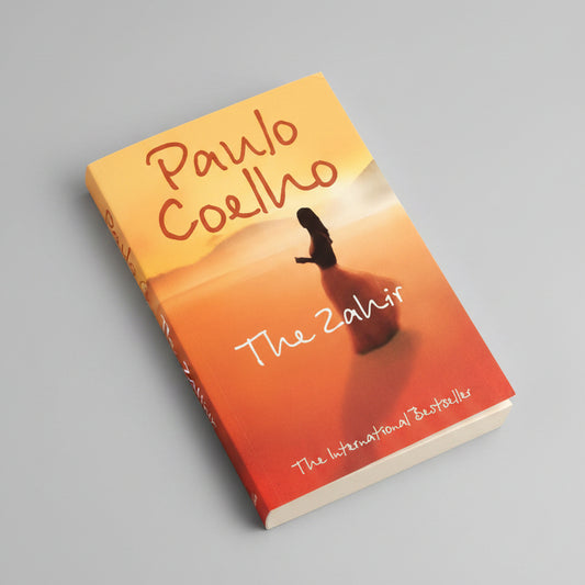 The Zahir by Paulo Coelho – Paperback Front Cover | Kitab Markaz